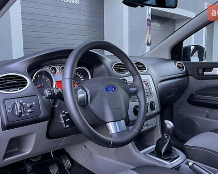 Черный Форд Фокус, объемом двигателя 1.8 л и пробегом 218 тыс. км за 5799 $, фото 27 на Automoto.ua