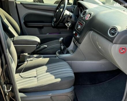 Черный Форд Фокус, объемом двигателя 1.6 л и пробегом 285 тыс. км за 6190 $, фото 24 на Automoto.ua