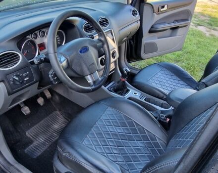 Черный Форд Фокус, объемом двигателя 1.6 л и пробегом 320 тыс. км за 4850 $, фото 4 на Automoto.ua