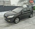 Черный Форд Фокус, объемом двигателя 1.6 л и пробегом 294 тыс. км за 6000 $, фото 1 на Automoto.ua