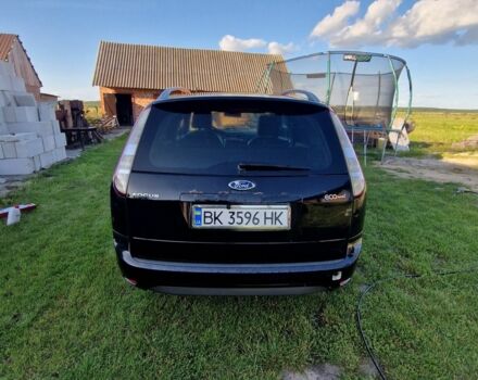 Черный Форд Фокус, объемом двигателя 1.6 л и пробегом 320 тыс. км за 4850 $, фото 3 на Automoto.ua