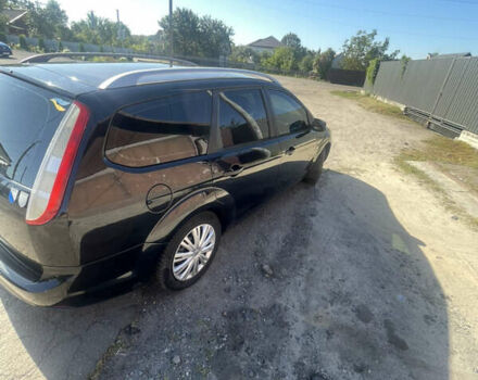 Черный Форд Фокус, объемом двигателя 1.6 л и пробегом 244 тыс. км за 5700 $, фото 5 на Automoto.ua