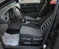 Черный Форд Фокус, объемом двигателя 1.6 л и пробегом 220 тыс. км за 5750 $, фото 23 на Automoto.ua