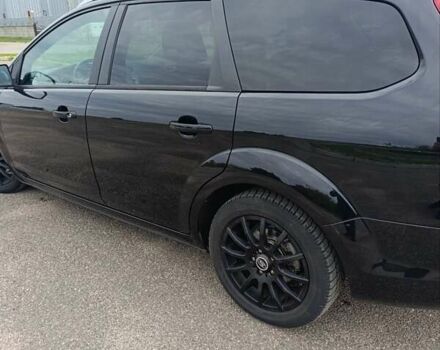 Черный Форд Фокус, объемом двигателя 1.8 л и пробегом 170 тыс. км за 6400 $, фото 18 на Automoto.ua