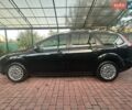 Черный Форд Фокус, объемом двигателя 1.8 л и пробегом 160 тыс. км за 5900 $, фото 3 на Automoto.ua