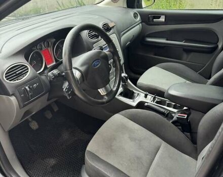 Черный Форд Фокус, объемом двигателя 1.56 л и пробегом 290 тыс. км за 5400 $, фото 13 на Automoto.ua