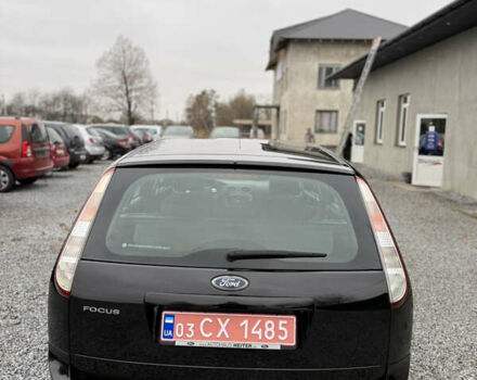 Черный Форд Фокус, объемом двигателя 1.6 л и пробегом 195 тыс. км за 5700 $, фото 11 на Automoto.ua