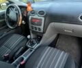 Черный Форд Фокус, объемом двигателя 1.6 л и пробегом 230 тыс. км за 6200 $, фото 2 на Automoto.ua