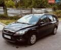 Черный Форд Фокус, объемом двигателя 1.8 л и пробегом 238 тыс. км за 5690 $, фото 17 на Automoto.ua
