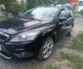 Чорний Форд Фокус, об'ємом двигуна 2 л та пробігом 306 тис. км за 5600 $, фото 1 на Automoto.ua