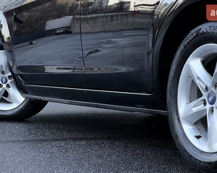 Черный Форд Фокус, объемом двигателя 1.8 л и пробегом 218 тыс. км за 5799 $, фото 12 на Automoto.ua