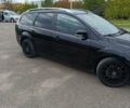 Черный Форд Фокус, объемом двигателя 1.8 л и пробегом 170 тыс. км за 6400 $, фото 7 на Automoto.ua