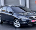 Черный Форд Фокус, объемом двигателя 1.8 л и пробегом 218 тыс. км за 5799 $, фото 7 на Automoto.ua