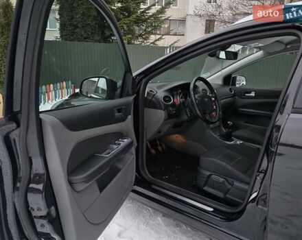 Черный Форд Фокус, объемом двигателя 1.6 л и пробегом 203 тыс. км за 5950 $, фото 17 на Automoto.ua