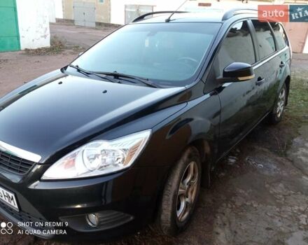 Черный Форд Фокус, объемом двигателя 1.6 л и пробегом 242 тыс. км за 5800 $, фото 3 на Automoto.ua