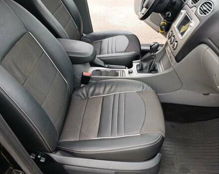 Черный Форд Фокус, объемом двигателя 1.8 л и пробегом 170 тыс. км за 6400 $, фото 27 на Automoto.ua