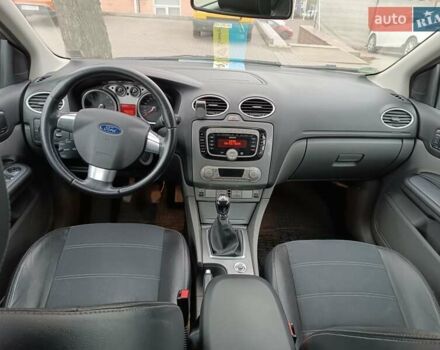 Черный Форд Фокус, объемом двигателя 1.8 л и пробегом 286 тыс. км за 5850 $, фото 12 на Automoto.ua