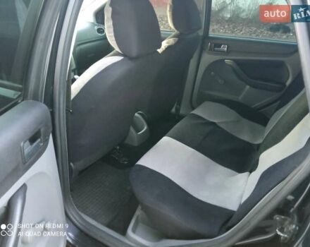 Черный Форд Фокус, объемом двигателя 1.6 л и пробегом 242 тыс. км за 5800 $, фото 5 на Automoto.ua