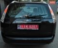 Черный Форд Фокус, объемом двигателя 1.6 л и пробегом 220 тыс. км за 5750 $, фото 8 на Automoto.ua