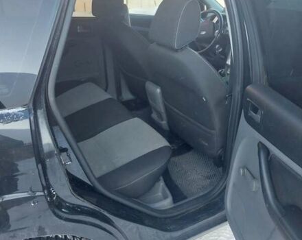 Черный Форд Фокус, объемом двигателя 1.56 л и пробегом 221 тыс. км за 6000 $, фото 4 на Automoto.ua