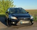 Черный Форд Фокус, объемом двигателя 1.8 л и пробегом 266 тыс. км за 5300 $, фото 1 на Automoto.ua