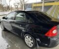 Черный Форд Фокус, объемом двигателя 1.6 л и пробегом 175 тыс. км за 5200 $, фото 7 на Automoto.ua