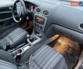 Черный Форд Фокус, объемом двигателя 1.6 л и пробегом 190 тыс. км за 5100 $, фото 2 на Automoto.ua