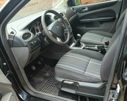 Черный Форд Фокус, объемом двигателя 1.6 л и пробегом 299 тыс. км за 5550 $, фото 4 на Automoto.ua