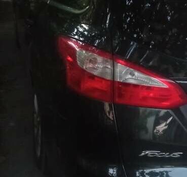 Черный Форд Фокус, объемом двигателя 1.6 л и пробегом 235 тыс. км за 8500 $, фото 1 на Automoto.ua