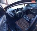 Черный Форд Фокус, объемом двигателя 1.6 л и пробегом 258 тыс. км за 6900 $, фото 11 на Automoto.ua
