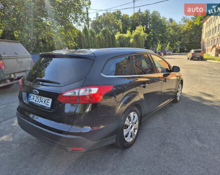 Черный Форд Фокус, объемом двигателя 1.6 л и пробегом 242 тыс. км за 7999 $, фото 5 на Automoto.ua