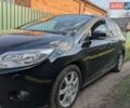 Черный Форд Фокус, объемом двигателя 1.6 л и пробегом 175 тыс. км за 8400 $, фото 1 на Automoto.ua