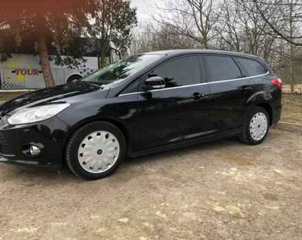 Черный Форд Фокус, объемом двигателя 1.6 л и пробегом 214 тыс. км за 7799 $, фото 1 на Automoto.ua