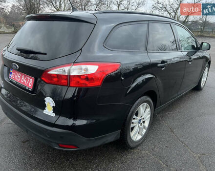Черный Форд Фокус, объемом двигателя 1.6 л и пробегом 180 тыс. км за 7400 $, фото 5 на Automoto.ua