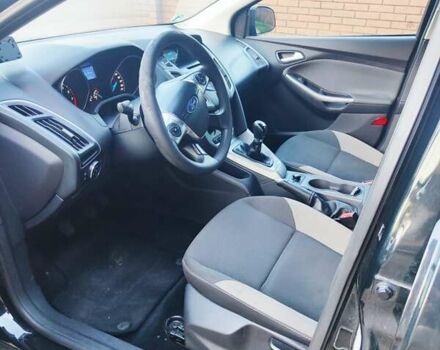 Черный Форд Фокус, объемом двигателя 1 л и пробегом 175 тыс. км за 6150 $, фото 5 на Automoto.ua