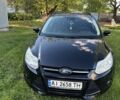 Черный Форд Фокус, объемом двигателя 1.6 л и пробегом 216 тыс. км за 7400 $, фото 1 на Automoto.ua