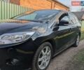 Черный Форд Фокус, объемом двигателя 1.6 л и пробегом 175 тыс. км за 8400 $, фото 1 на Automoto.ua