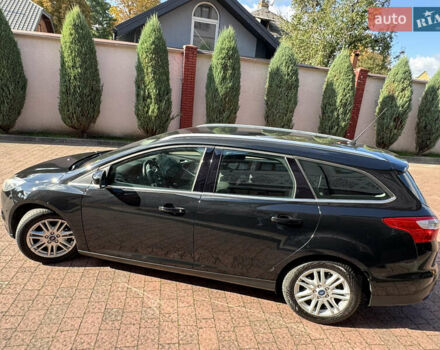 Чорний Форд Фокус, об'ємом двигуна 1.6 л та пробігом 227 тис. км за 8299 $, фото 39 на Automoto.ua