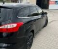 Черный Форд Фокус, объемом двигателя 1.56 л и пробегом 264 тыс. км за 7215 $, фото 1 на Automoto.ua