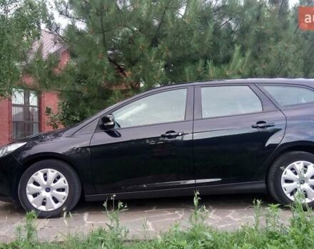 Черный Форд Фокус, объемом двигателя 1.6 л и пробегом 177 тыс. км за 7600 $, фото 1 на Automoto.ua