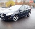 Черный Форд Фокус, объемом двигателя 2 л и пробегом 214 тыс. км за 7600 $, фото 1 на Automoto.ua