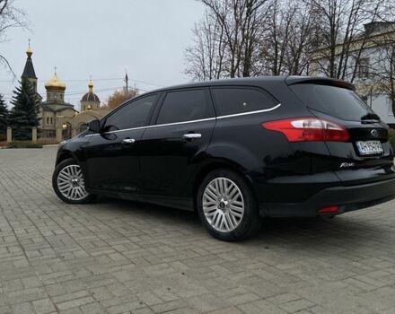 Черный Форд Фокус, объемом двигателя 1.6 л и пробегом 196 тыс. км за 7700 $, фото 2 на Automoto.ua