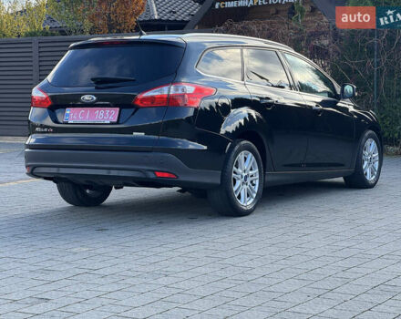 Чорний Форд Фокус, об'ємом двигуна 1.6 л та пробігом 278 тис. км за 8599 $, фото 78 на Automoto.ua