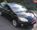 Чорний Форд Фокус, об'ємом двигуна 2 л та пробігом 242 тис. км за 7777 $, фото 4 на Automoto.ua
