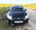 Черный Форд Фокус, объемом двигателя 1.56 л и пробегом 253 тыс. км за 7850 $, фото 1 на Automoto.ua