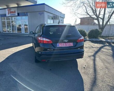 Чорний Форд Фокус, об'ємом двигуна 1.59 л та пробігом 229 тис. км за 8750 $, фото 9 на Automoto.ua