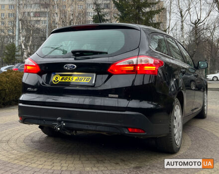 Черный Форд Фокус, объемом двигателя 1.6 л и пробегом 235 тыс. км за 7800 $, фото 6 на Automoto.ua