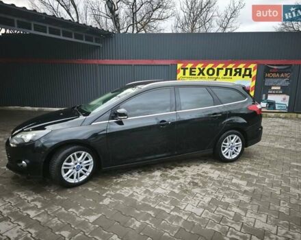 Черный Форд Фокус, объемом двигателя 1.6 л и пробегом 325 тыс. км за 7000 $, фото 2 на Automoto.ua