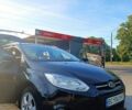 Чорний Форд Фокус, об'ємом двигуна 1 л та пробігом 156 тис. км за 6800 $, фото 1 на Automoto.ua