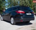 Черный Форд Фокус, объемом двигателя 1.56 л и пробегом 260 тыс. км за 7700 $, фото 5 на Automoto.ua